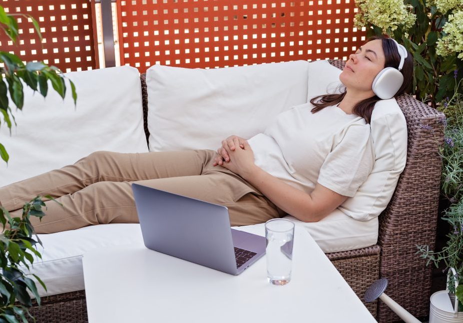 Young woman having online hypnotherapy regression session Hypnotherapy Auckland